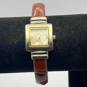 Gold square watch